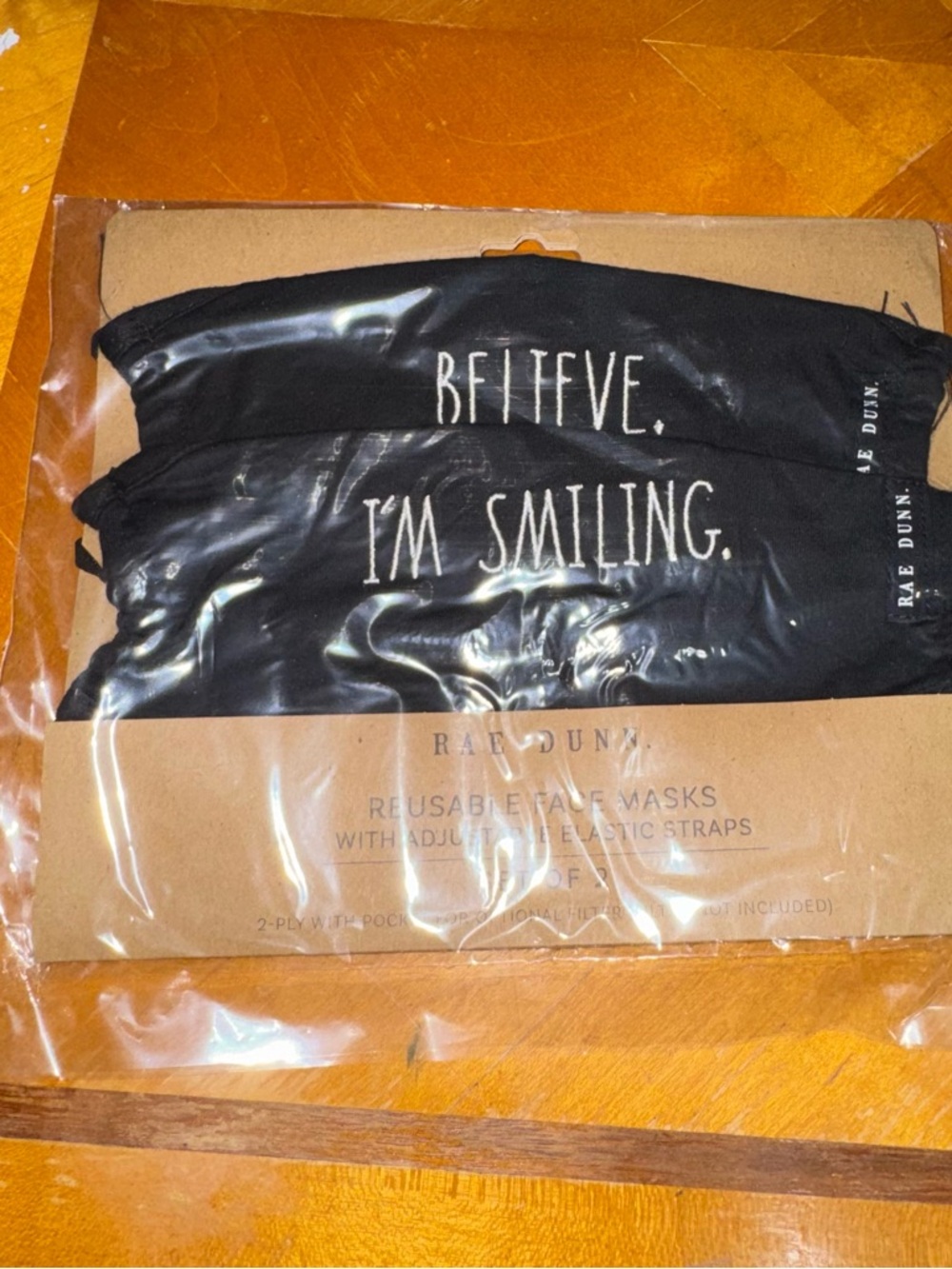 Rae Dunn Black Face Masks with White Text - "BELIEVE." "I'M SMILING."
